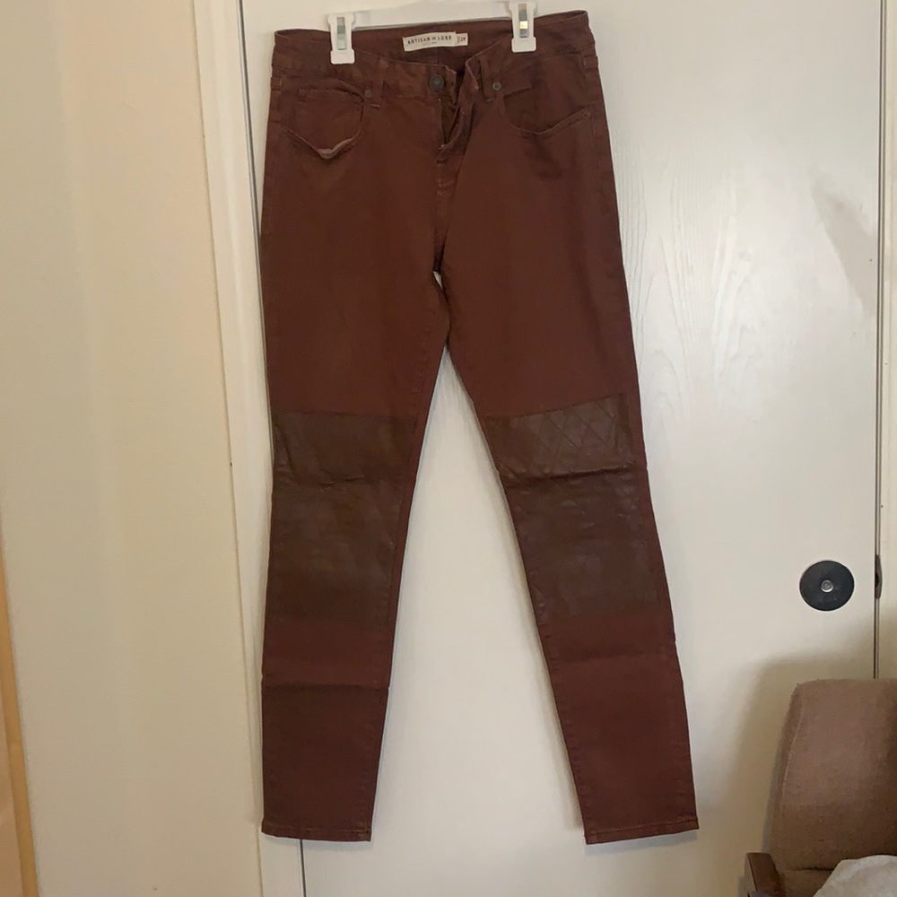 Rusty jeans with leather knee patches